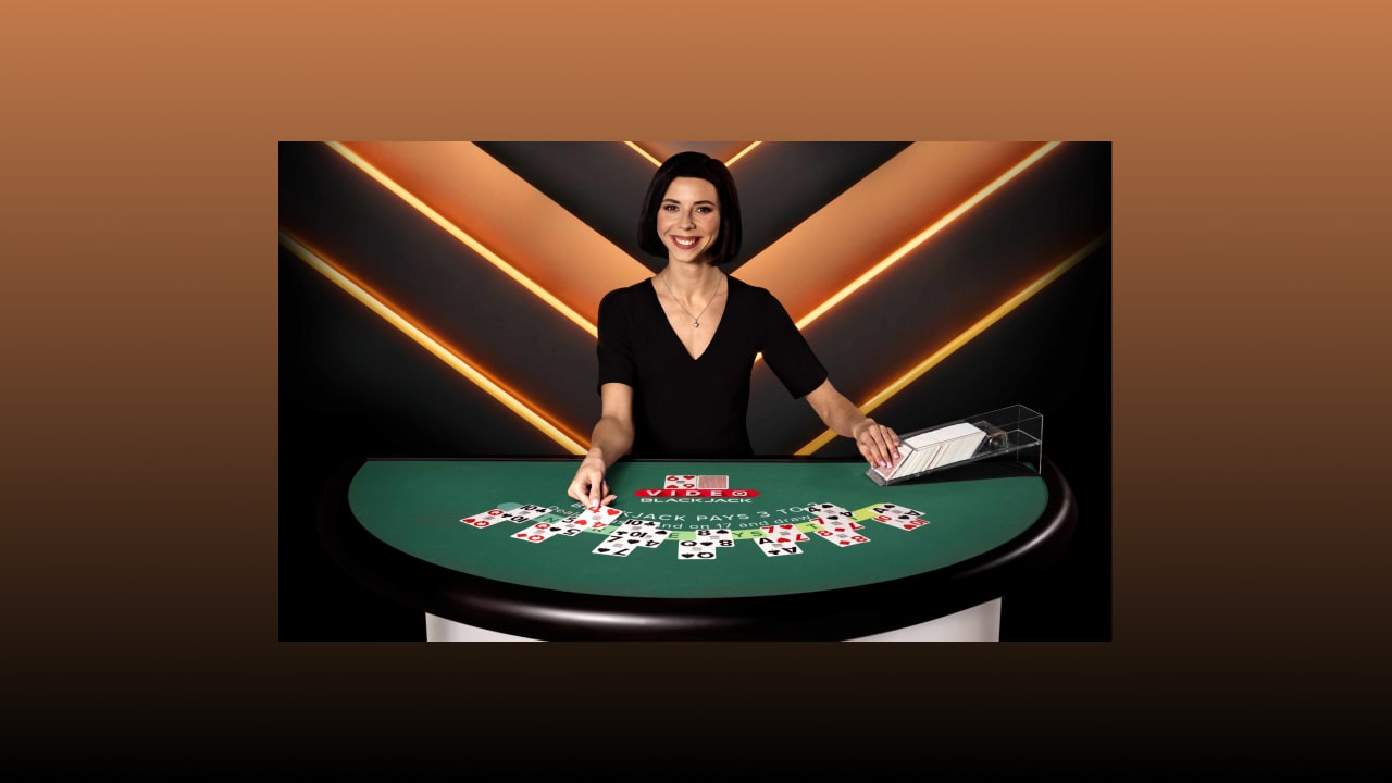 Smiling female Live casino blackjack dealer dealing cards on a Blackjack table